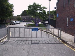 Barrier Gate Lock on a swing gate at the front of a housing estate