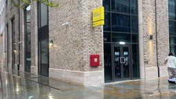 A Premises Information Box is installed by the entrance to a Unite Students building.